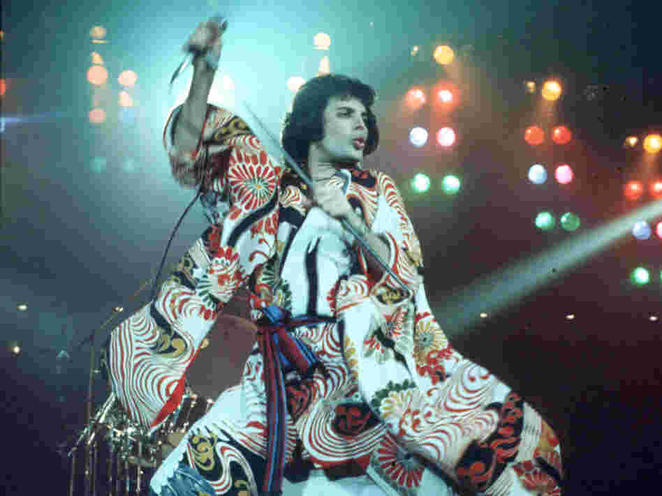 Freddie Merucury, performing live with Queen, circa 1970. Freddie Merucury, performing live with Queen, circa 1970.