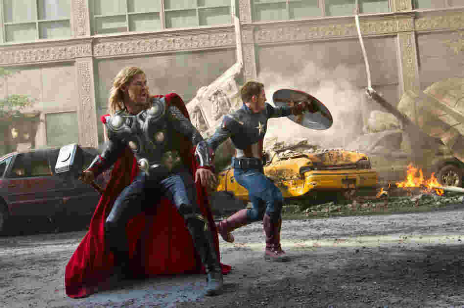 Thor (Chris Hemsworth, left) and Captain America (Chris Evans) join up with Iron Man and the Hulk to save the Earth in The Avengers. Thor (Chris Hemsworth, left) and Captain America (Chris Evans) join up with Iron Man and the Hulk to save the Earth in The Avengers.