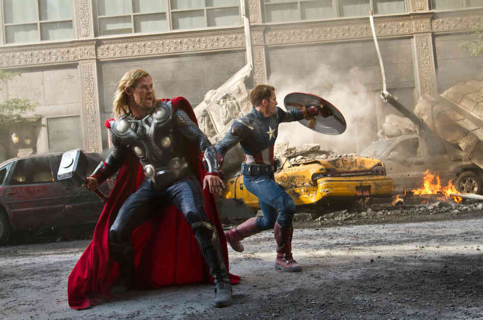 Thor (Chris Hemsworth, left) and Captain America (Chris Evans) join up with Iron Man and the Hulk to save the Earth in The Avengers. Thor (Chris Hemsworth, left) and Captain America (Chris Evans) join up with Iron Man and the Hulk to save the Earth in The Avengers.