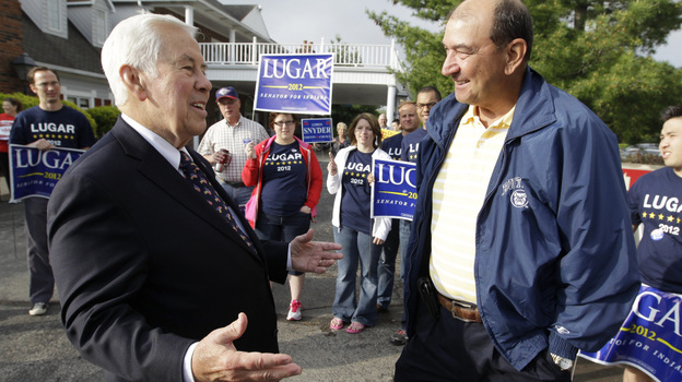 Sen. Richard Lugar talks with Joe Purichia before voting on Tuesday in Greenwood, Ind. (AP)