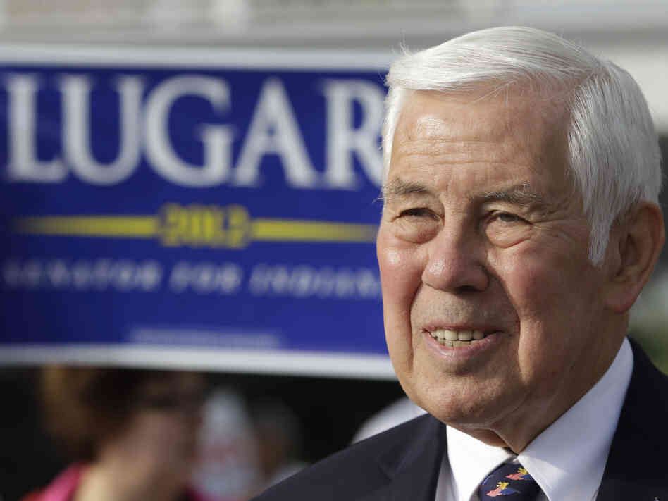 Sen. Richard Lugar, R-Ind., meets with voters Tuesday outside of a polling place in Greenwood, Ind. Lugar is being challenged in the Republican primary by Indiana Treasurer Richard Mourdock.