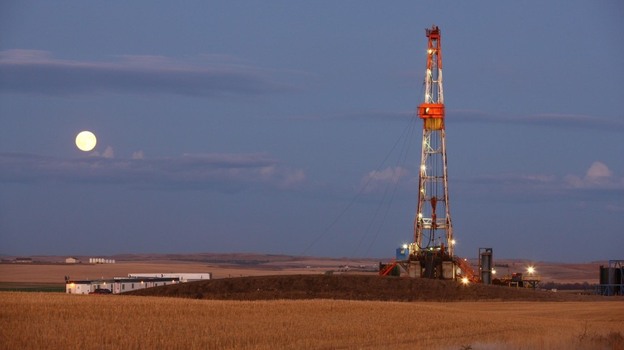 Oil and gas production in the U.S. is rising, and the U.S. is expected to be less dependent on foreign energy in the coming years. This oil drilling rig, shown in October 2011, is outside Watford City, N.D., a state that has seen a boom in energy production.