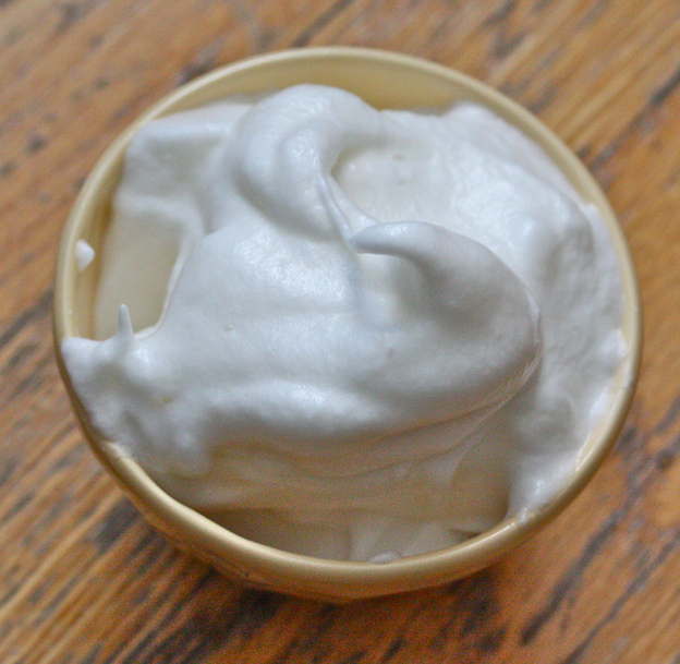 Egg whites whip up best at room temperature. Whipped into peaks, they'll be folded gently into the souffle base.