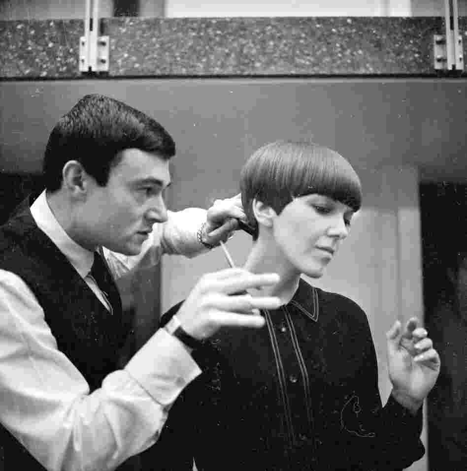 Clothes designer Mary Quant, one of the leading lights of the British fashion scene in the 1960's, having her hair cut by another fashion icon, hairdresser Vidal Sassoon in 1964.
