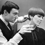 Clothes designer Mary Quant, one of the leading lights of the British fashion scene in the 1960's, having her hair cut by another fashion icon, hairdresser Vidal Sassoon in 1964.