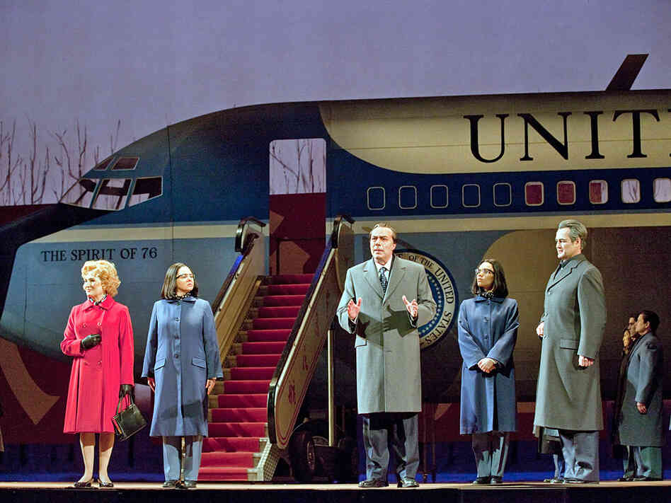 John Adams' Nixon in China, produced at the Metropolitan Opera in January 2011. Left to right: Janis Kelly as Pat Nixon, Teresa S. Herold as the Second Secretary to Mao, James Maddalena as Richard Nixon, Ginger Costa Jackson as the First Secretary to Mao, Russell Braun as Chou En-lai.