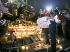 A woman lights a candle during a tribute to slain Mexican journalists at the Monument of Independence in Mexico City on May 5. The vigil took place to protest violence against the press after the brutal murders of four journalists in Veracruz state. A woman lights a candle during a tribute to slain Mexican journalists at the Monument of Independence in Mexico City on May 5. The vigil took place to protest violence against the press after the brutal murders of four journalists in Veracruz state.