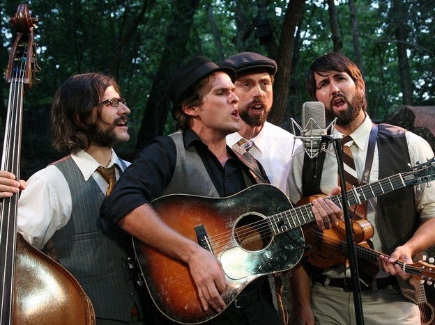 A heavy hymn, "Rain in the Valley" is sparse and dense at once, carried by The Steel Wheels' four interlocking voices.