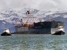 April 5, 1989: Tugboats tow the Exxon Valdez off Bligh Reef in Alaska's Prince William Sound. April 5, 1989: Tugboats tow the Exxon Valdez off Bligh Reef in Alaska's Prince William Sound.