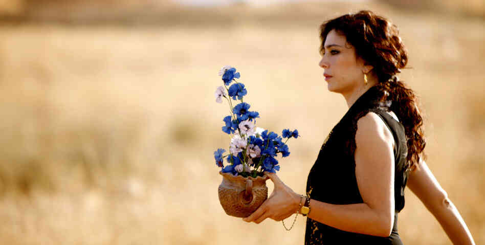 Muslim and Christian women team up to try everything imaginable to distract their men from war in the Lebanese film Where Do We Go Now? Director and actress Nadine Labaki plays the lead role of Amale. Muslim and Christian women team up to try everything imaginable to distract their men from war in the Lebanese film Where Do We Go Now? Director and actress Nadine Labaki plays the lead role of Amale.