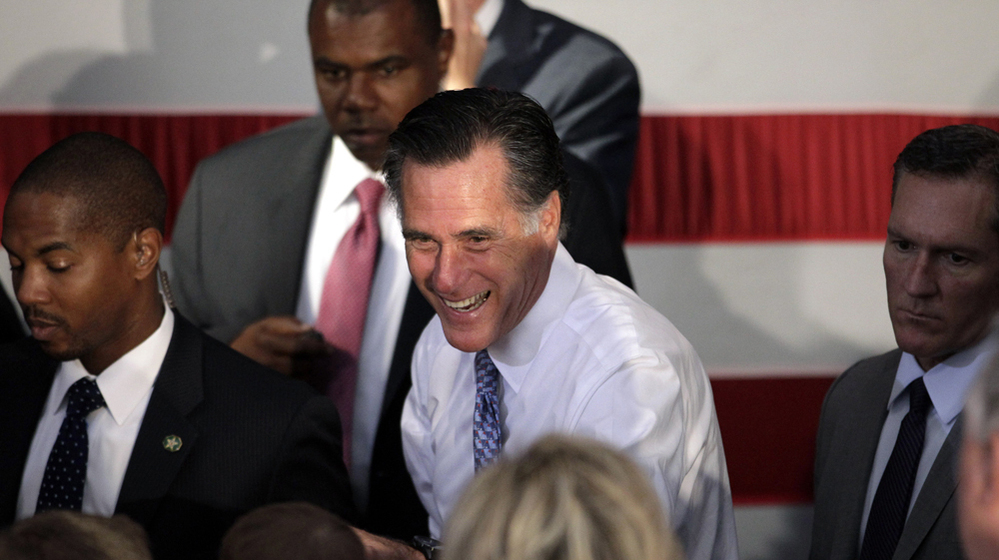Republican presidential candidate Mitt Romney greets supporters at a campaign stop in Omaha, Neb.,on Thursday.