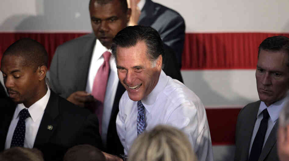 Republican presidential candidate Mitt Romney greets supporters at a campaign stop in Omaha, Neb.,on Thursday.