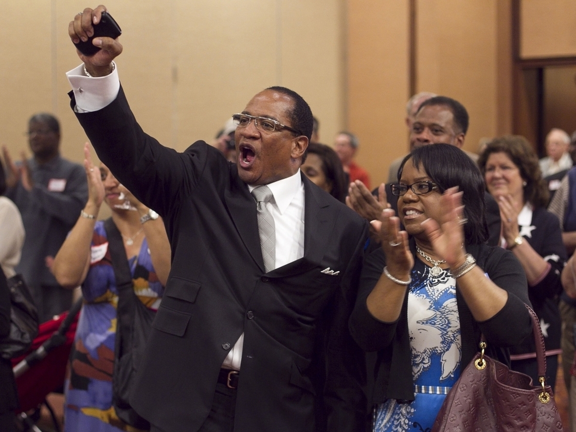 Dr. Patrick Wooden, senior pastor of the Upper Room Church of God In Christ and his wife, Pamela Wooden, celebrate early returns that show strong support for Amendment One during an election night party at the North Raleigh Hilton on Tuesday, May 8, 2012. The Amendment would ban gay marriage in the state. (Robert Willett/Raleigh News