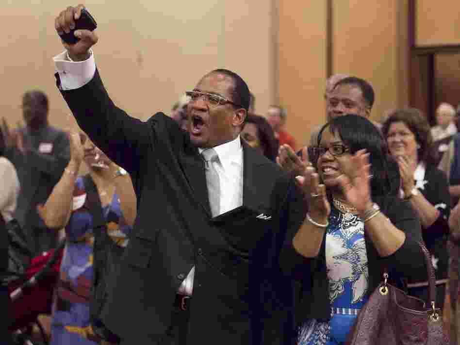 Dr. Patrick Wooden, senior pastor of the Upper Room Church of God In Christ and his wife, Pamela Wooden, celebrate early returns that show strong support for Amendment One during an election night party at the North Raleigh Hilton on Tuesday, May 8, 2012. The Amendment would ban gay marriage in the state. (Robert Willett/Raleigh News