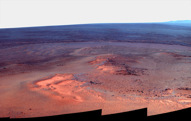 A mosaic of images taken in January 2012 shows Opportunity's vista north (left) and northeast (right), in an outcrop known as "Greeley Haven," where the rover spent its fifth  Martian winter. The image released by NASA is presented in "false color," to make differences in the landscape easier to see.