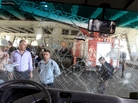 Syrians appear behind the damaged windshield of a minibus as they inspect the site of a blast in the central Midan district of Damascus last month. A new jihadist organization in Syria claimed responsibility for the attack. Syrians appear behind the damaged windshield of a minibus as they inspect the site of a blast in the central Midan district of Damascus last month. A new jihadist organization in Syria claimed responsibility for the attack.