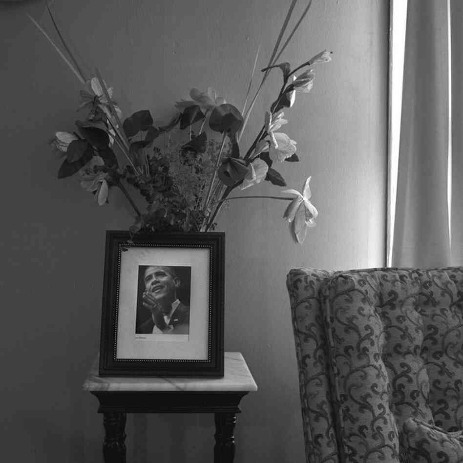 A portrait of President Obama sits on a small table inside the home of Mound Bayou's former postmaster, Columbus Preston Holmes, November 2011.