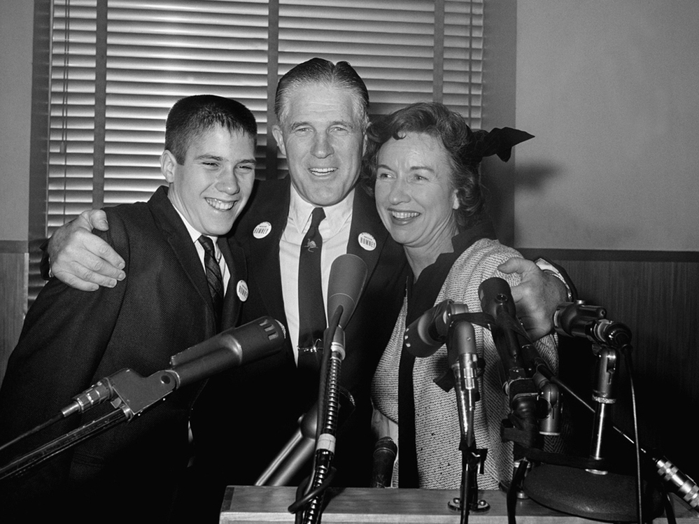 Mitt Romney, then 14, with his father, George, and mother, Lenore, in 1962.