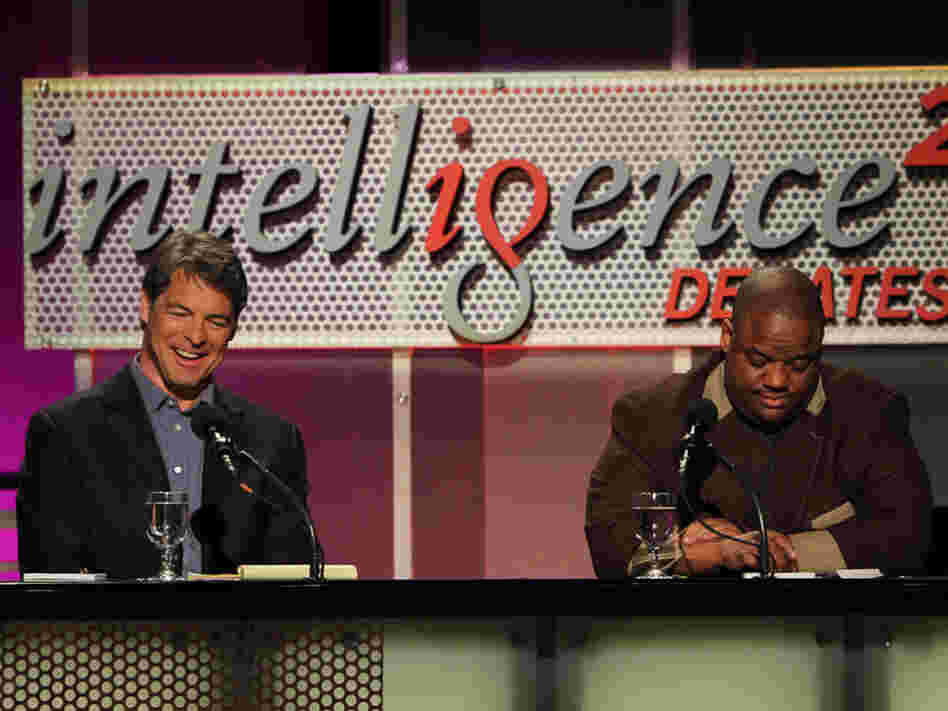 Tim Green (left) and Jason Whitlock argue against banning college football at a May 8 Intelligence Squared debate.