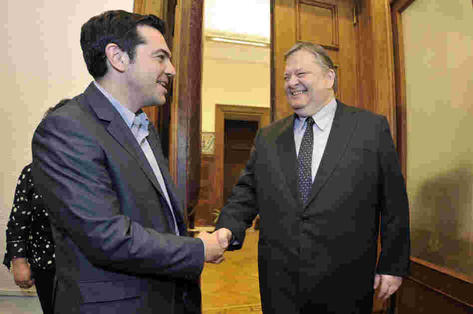 Greece's radical leftist party Syriza chief Alexis Tsipras (L) shakes hands with Socialists leader Evangelos Venizelos before their meeting at the Greek parliament in Athens on Friday. Venizelos admitted that he had failed in a last-ditch bid to form a government after Syriza key leftist party ruled out joining a pro-austerity coalition.