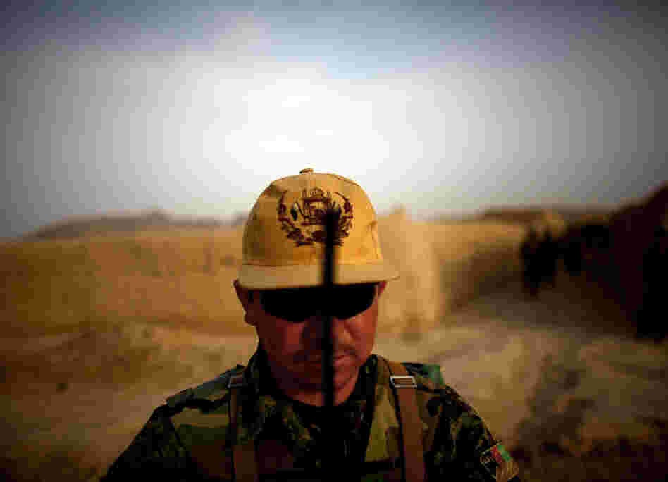 Afghan National Army platoon Sgt. Hyatulla Hakimi watches over his men while on a joint patrol. Afghan National Army platoon Sgt. Hyatulla Hakimi watches over his men while on a joint patrol.