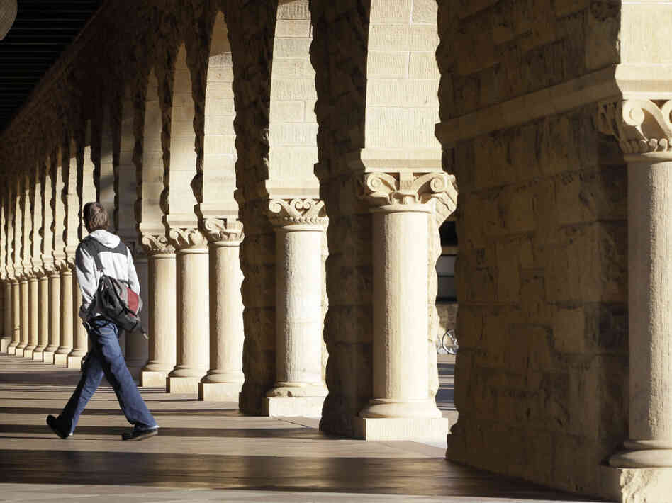 A Stanford University student walks through the campus in Palo Alto, Calif. A Stanford University student walks through the campus in Palo Alto, Calif.