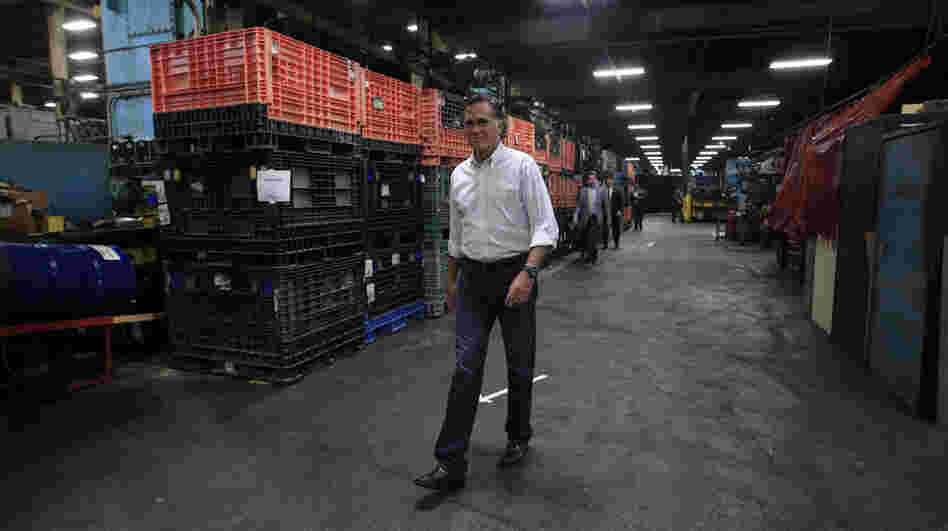 Republican presidential candidate Mitt Romney arrives for a town hall-style meeting at Stamco Industries, a truck parts supplier, in Euclid, Ohio, on Monday.