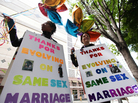 Marriage equality supporters Teri McClain (left) and Mary Beth Brotski demonstrate Thursday in Seattle. Marriage equality supporters Teri McClain (left) and Mary Beth Brotski demonstrate Thursday in Seattle.