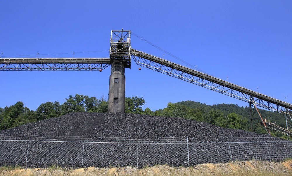 Coal piled near a conveyor at a mine near Meta, Ky., in August 2011.