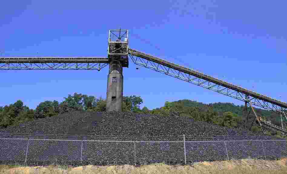 Coal piled near a conveyor at a mine near Meta, Ky., in August 2011.