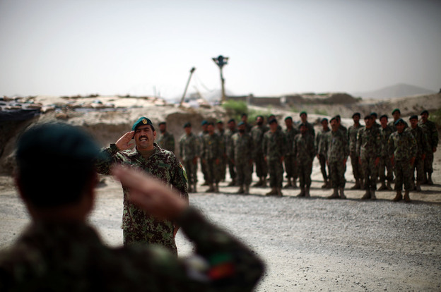 Brig. Gen. Ahmed Habbibi of the Afghan National Army salutes his soldiers in Panjwai district near Kandahar in southern Afghanistan. Brig. Gen. Ahmed Habbibi of the Afghan National Army salutes his soldiers in Panjwai district near Kandahar in southern Afghanistan.