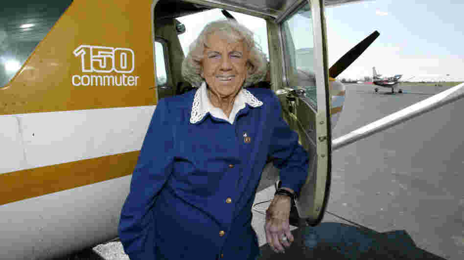 Evelyn "Mama Bird" Johnson poses by at the airport she managed in Morristown, Tenn., in this 2005 file photo. Johnson, who began flying in 1944, died Thursday.