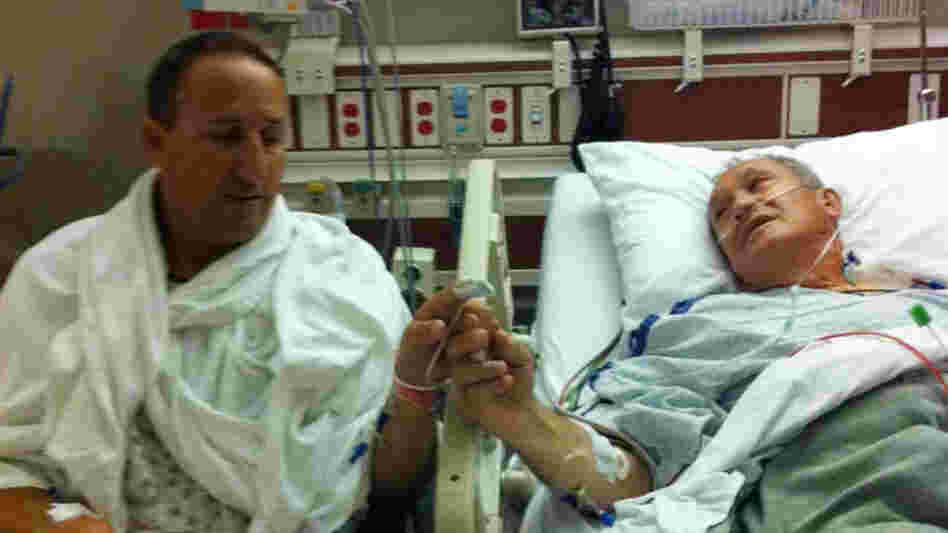 All in the family: Nino Giarratano (left), the head baseball coach at the University of San Francisco, joins hands with his father, Mickey Giarratano, after the transplant of a kidney from son to father at Porter Adventist Hospital in Denver last year. All in the family: Nino Giarratano (left), the head baseball coach at the University of San Francisco, joins hands with his father, Mickey Giarratano, after the transplant of a kidney from son to father at Porter Adventist Hospital in Denver last year.