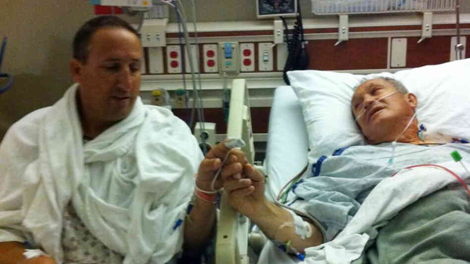 All in the family: Nino Giarratano (left), the head baseball coach at the University of San Francisco, joins hands with his father, Mickey Giarratano, after the transplant of a kidney from son to father at Porter Adventist Hospital in Denver last year. All in the family: Nino Giarratano (left), the head baseball coach at the University of San Francisco, joins hands with his father, Mickey Giarratano, after the transplant of a kidney from son to father at Porter Adventist Hospital in Denver last year.