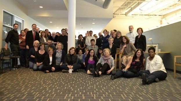 Fresh Air's staff, surrounded by employees of WHYY at their 25th-anniversary party.