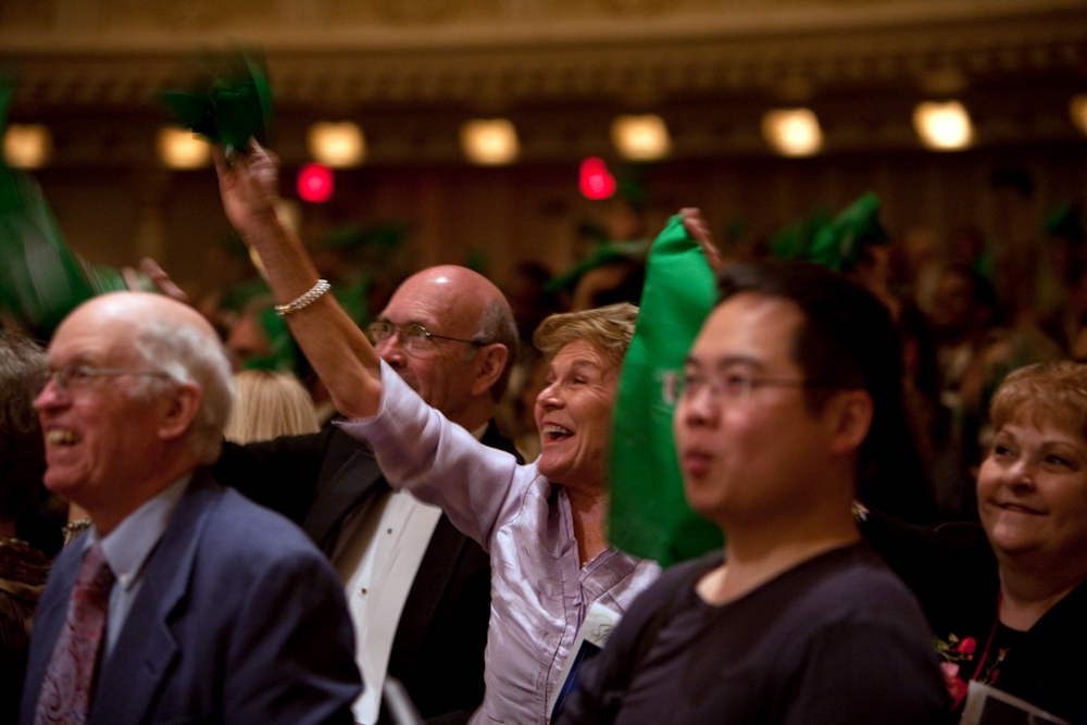 Nashville natives show hometown pride, waving their green handkerchiefs. Over 500 fans traveled from Nashville to hear the hometown band. 