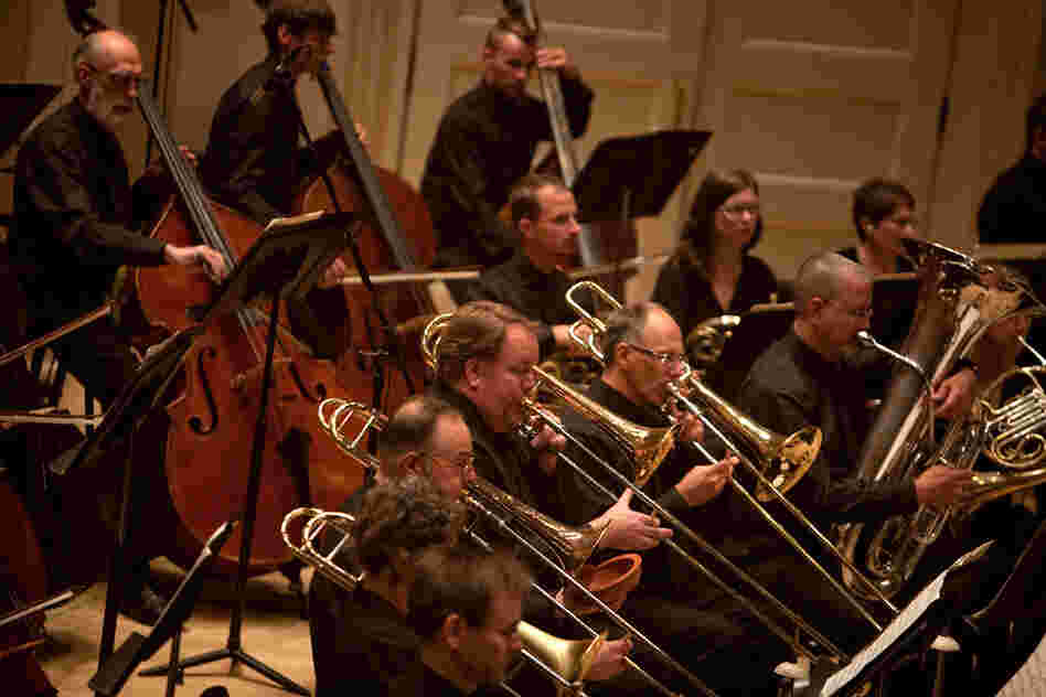 It took another composer, Larry Austin, three decades to complete a version of Ives' unfinished symphony, which calls for a gigantic brass section.