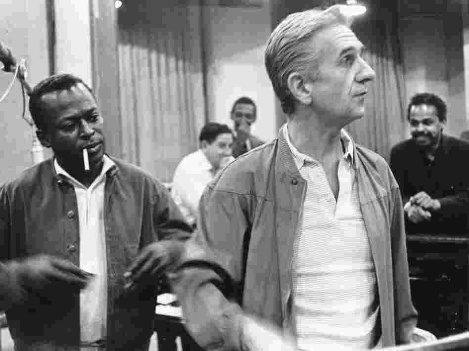 Gil Evans in the studio with Miles Davis, circa 1970.
