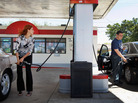 Mayeli Vasallo (left) and Jorge Monte pump gas in Miami in April. The average price of a gallon of gas has dropped 20 cents in the last month, to $3.73. Mayeli Vasallo (left) and Jorge Monte pump gas in Miami in April. The average price of a gallon of gas has dropped 20 cents in the last month, to $3.73.