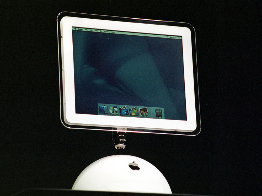 Apple's iMac debuted in 2002, when flat-screen monitors were just coming out. The screen seems to float above the base, a design inspired by sunflowers Steve Jobs' wife had planted in their garden.