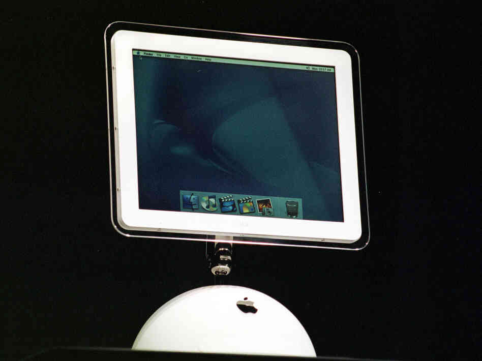 Apple's iMac debuted in 2002, when flat-screen monitors were just coming out. The screen seems to float above the base, a design inspired by sunflowers Steve Jobs' wife had planted in their garden.