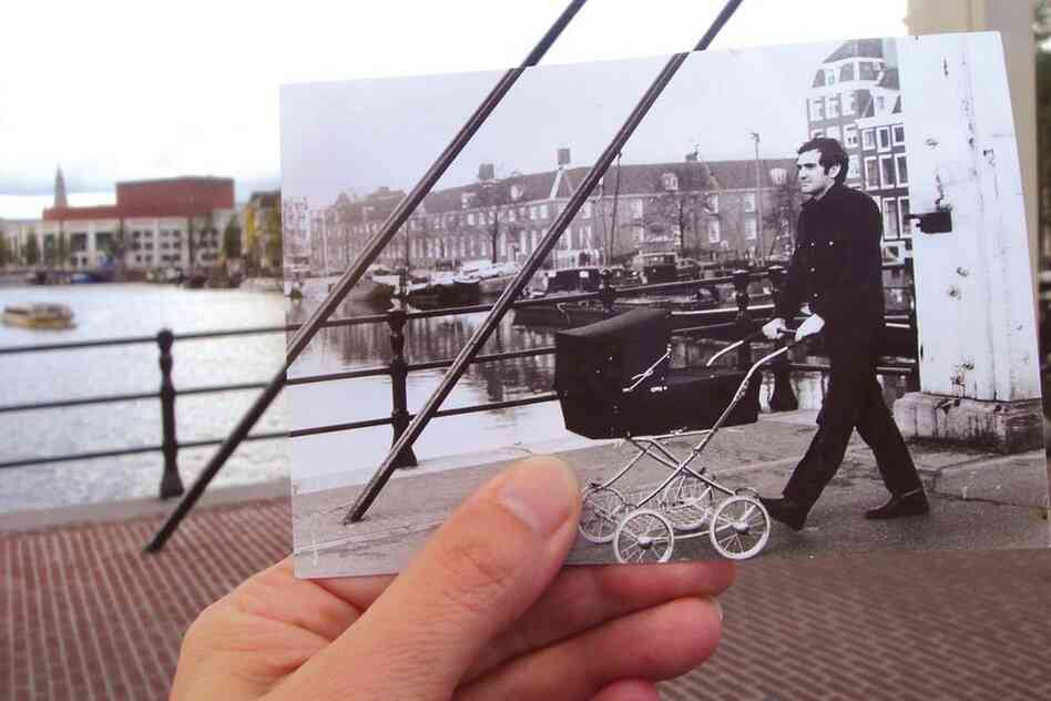 Dear Photograph,At the time it was not common for a man to walk behind a pram. I'm so proud of my father.Eva