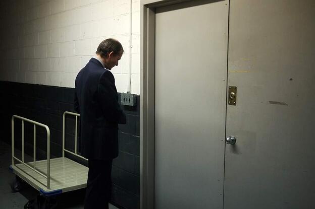 Jeff Roth unlocks the doors to the "morgue" of The New York Times.