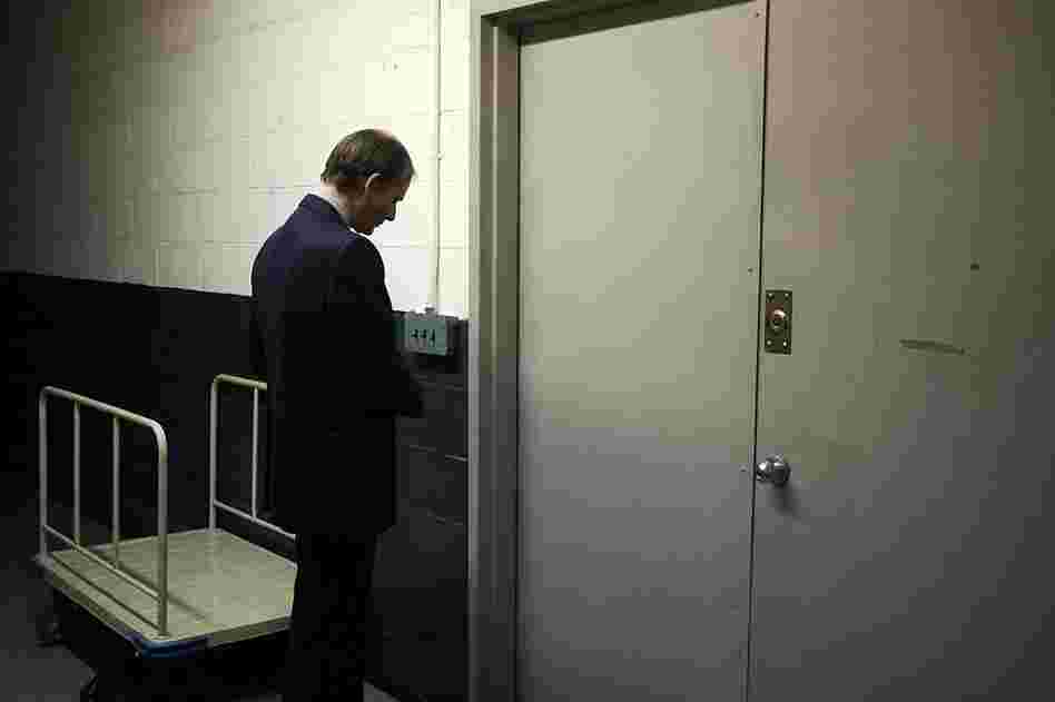Jeff Roth unlocks the doors to the "morgue" of The New York Times.