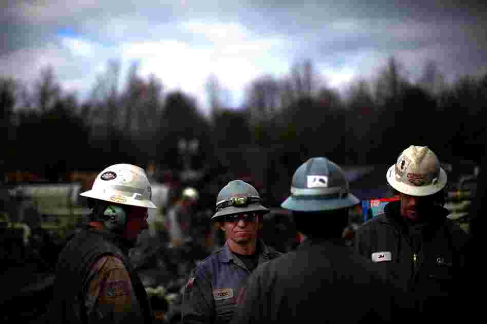 Hydraulic fracturing lets drillers tap previously inaccessible natural gas reservoirs. Workers at Chesapeake Energy are seen on the job near Towanda, Pa.