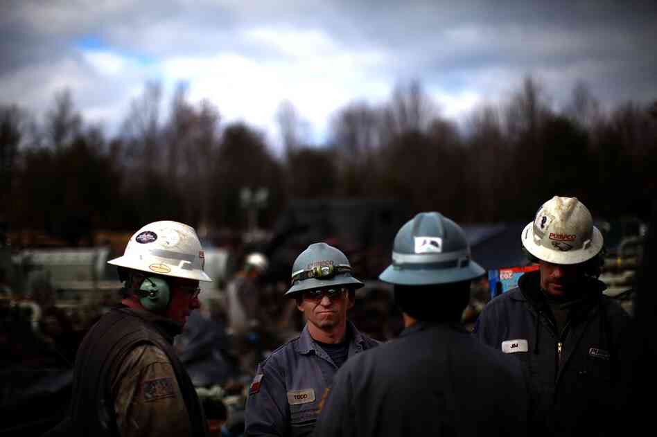 Hydraulic fracturing lets drillers tap previously inaccessible natural gas reservoirs. Workers at Chesapeake Energy are seen on the job near Towanda, Pa.