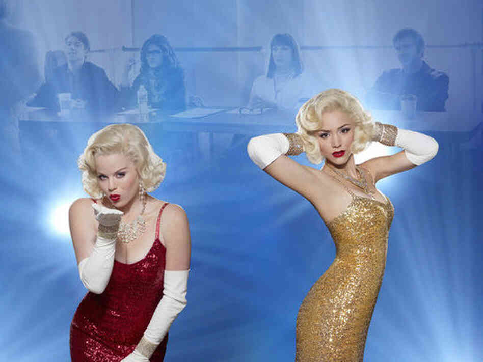 In foggy focus: Christian Borle as Tom Levitt, Debra Messing as Julia Houston, Anjelica Huston as Eileen Rand, Jack Davenport as Derek Wills. In actual focus: Megan Hilty as Ivy Lynn and Katharine McPhee as Karen Cartwright on NBC's Smash. In foggy focus: Christian Borle as Tom Levitt, Debra Messing as Julia Houston, Anjelica Huston as Eileen Rand, Jack Davenport as Derek Wills. In actual focus: Megan Hilty as Ivy Lynn and Katharine McPhee as Karen Cartwright on NBC's Smash.