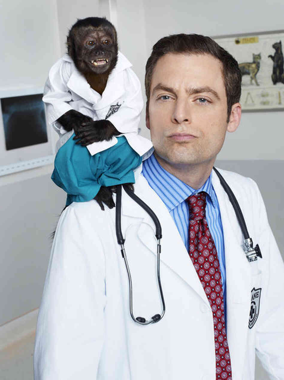Crystal as Dr. Zaius and Justin Kirk as Dr. George Coleman on NBC's new fall comedy, Animal Practice. Crystal as Dr. Zaius and Justin Kirk as Dr. George Coleman on NBC's new fall comedy, Animal Practice.