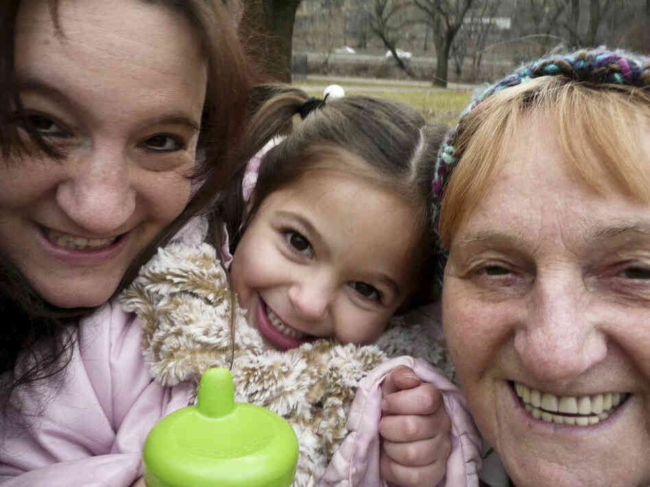"Here's a picture of my awesome mom, my adorable niece and me. Three generations of funny, silly ladies with big hearts. Family is very important and we do our best to help each other out."