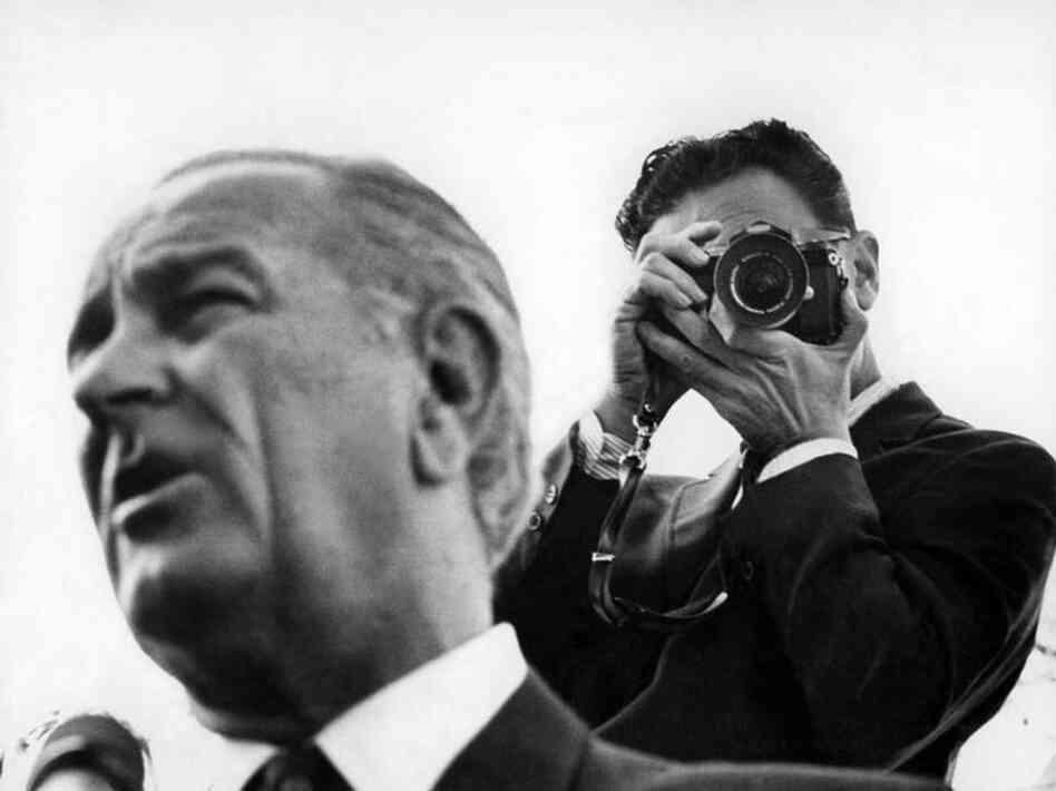 Nov. 23, 1968: The Times wrote about White House photographer Yoichi Robert Okamoto (right), who produced most of the photos of President Lyndon B. Johnson at the time. The reporter wrote, "Some persons are appalled by the size and expense of Mr. Johnson's picture operation. Others believe the price is little enough to pay for pictures that will be priceless to historians."